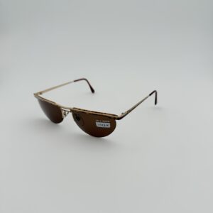 Occhiali da Sole Vogue VO3040 d’Epoca – Silhouette Frameless Avvolgente & Lenti Marroni