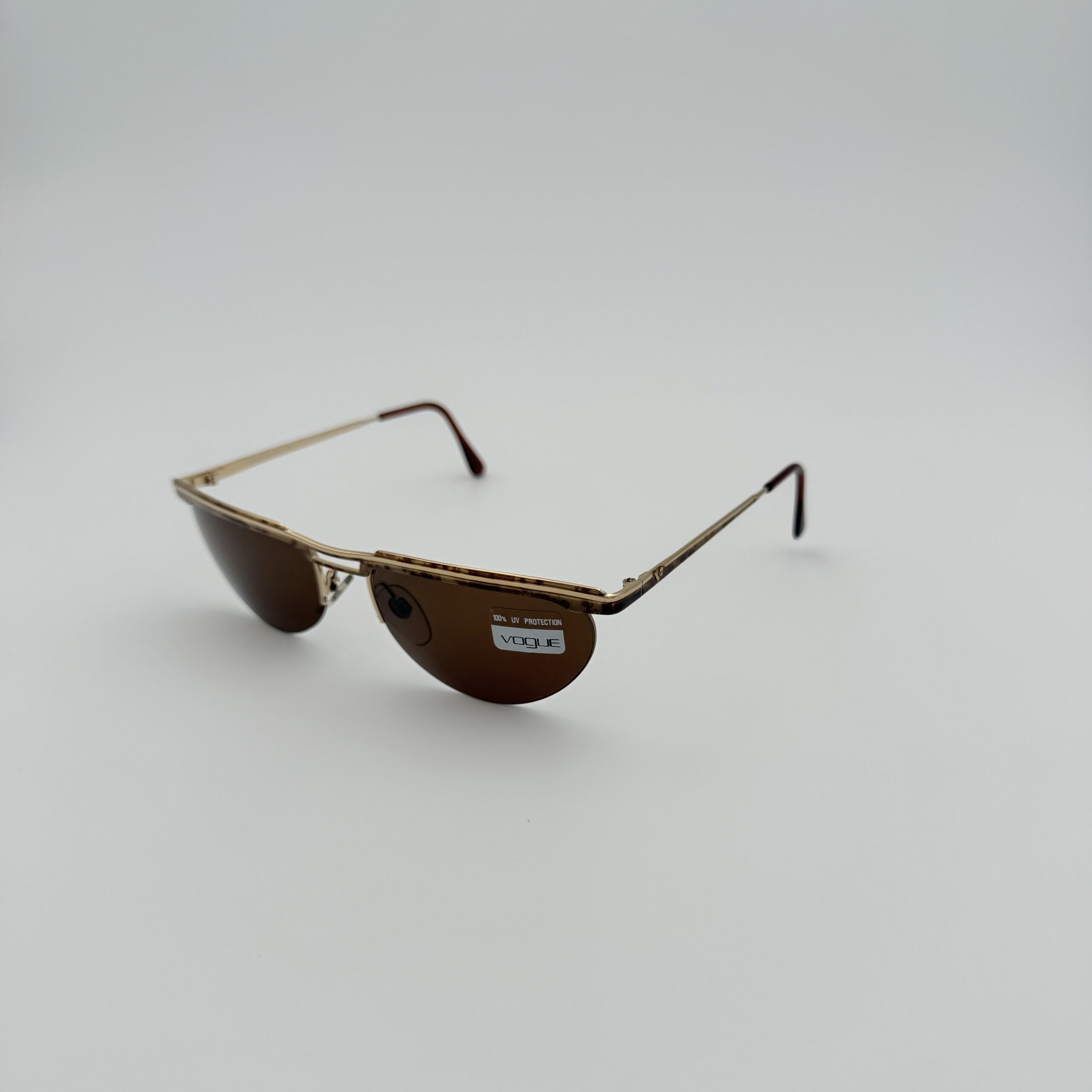 Occhiali da Sole Vogue VO3040 d’Epoca – Silhouette Frameless Avvolgente & Lenti Marroni - immagine 2